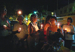 Some of those participating in the candlelight vigil on the Christiansted boardwalk.