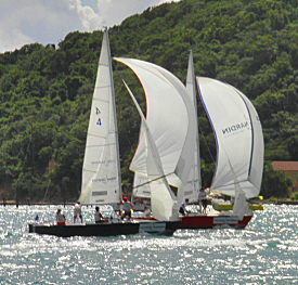 Julie Bossard and her crew (No. 4) battle Liz Baylis in a match race.