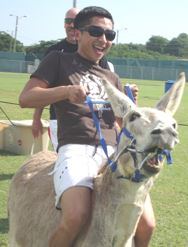 Ha Trinh of San Jose, Ca., careens around the track in Sunday's Donkey Derby.