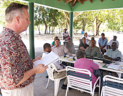 Tom Bolt (left) fires questions at Friday's meeting.