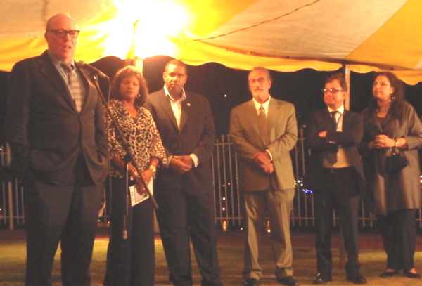 From left, screenwriter Terry George speaks as Cecile and Gov. John deJongh, Tony Romano, Ross Bleckner and U.N. official Simone Monasebian look on.