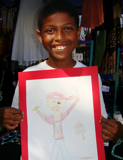 David Asencion, 10, sells his drawings at Sunday's Starving Artist Holiday Sale.