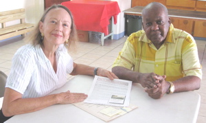 Robin Swank and Elroy Sprauve of the St. John Historical Society.