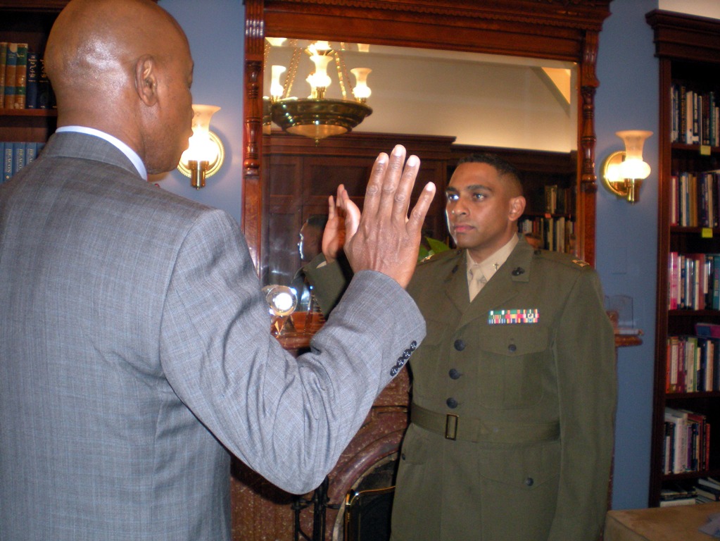 John Logan assumes the rank of lieutenant commander. 