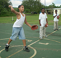 Alberto Velasquez (left to right), Elijah Jackson and Raheem Clarke play catch.