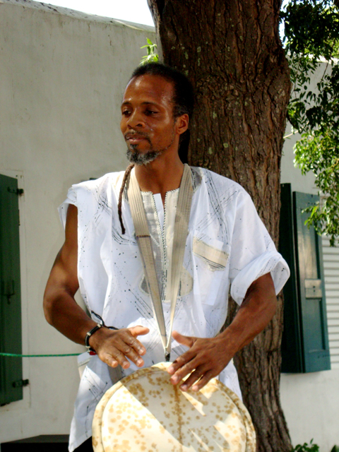 Adrian Edwards plays drums with a group from the Dembaya Arts Conservatory Sunday at the Starving Artsts Sale.