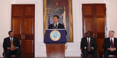 Anthony Babauta, assistant secretary of the interior for Insular Areas, speaks at Wednesday's press conference on the recently concluded agreement to expand Cruzan Rum. To the left is Gov. John deJongh Jr., to the right, Lt. Gov. Gregory Francis and Patrick Koley, senior vice president of strategy and corporate development for Fortune Brands