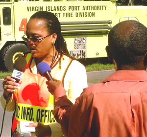 Police Public Information Officer Melody Rames talks to the media gathered at Thursday's crash site.