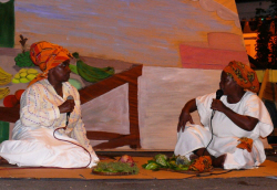 Valerie Hendricks (left) as Queen Mary and Donna Asheba as Queen Mathilde in a performance of "1878 Queen Mary and Dem."