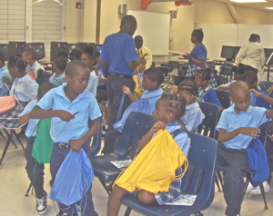 Lockhart students check out their new backpacks.