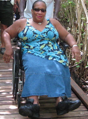 St. John resident Janet George-Carty tries out the new accessible trail after cutting the opening ribbon.