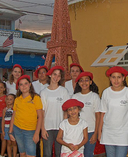 Frenchtown hostesses pose before the Eiffel Tower. 