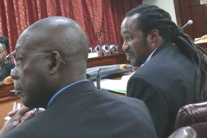 Agriculture Commissioner Louis Petersen, right, at Wednesday's budget hearing. To his left is Assistant Commissioner Luther Renee.