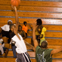 Umoja’s Ian Fleming soars above a North Star Defender for two.