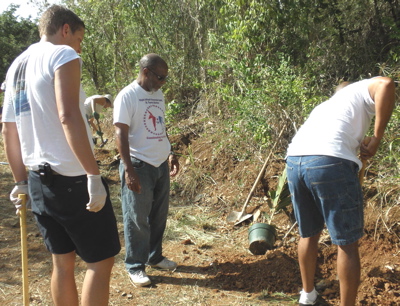 Volunteers plant trees at the Humane Care campus.