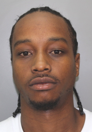 The driver of the Ford Explorer, Cariem Charles, 22, faces weapons charges.