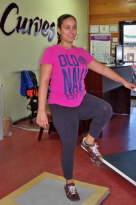 Marie Ortize works out at Curves.