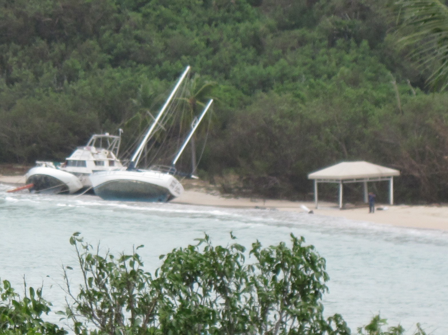 Boats on the beach at Great Cruz Bay by the Westin Resort and Villas.