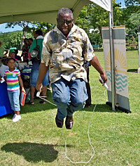 Lt. Gov. Gregory Francis shows his physical fitness by jumping rope.
