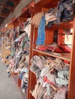 Shelf after shelf of clothing at the Murambi Genocide Memorial bears testimony to the thousands killed.