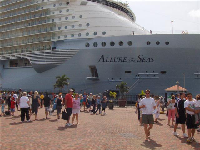 The Allure of the Seas towers over the crowd assembled at the Crown Bay dock. (Photo Molly Morris)