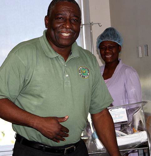 Lt. Gov. Gregory R. Francis spreads Christmas cheer around the pediatric ward of Schneider Regional Medical Center.