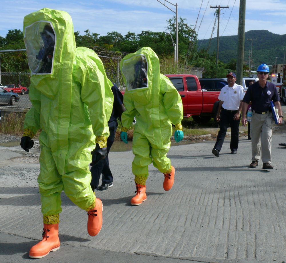 Hazmat workers enter St. Croix's WAPA plant at Estate Richmond as part of Thursday's exercise.
