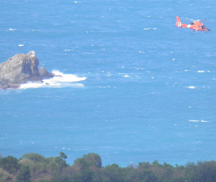 A Coast Guard chopper scours the area Sunday for the drifting dinghy. (Photo courtesy Joey Hamilton)