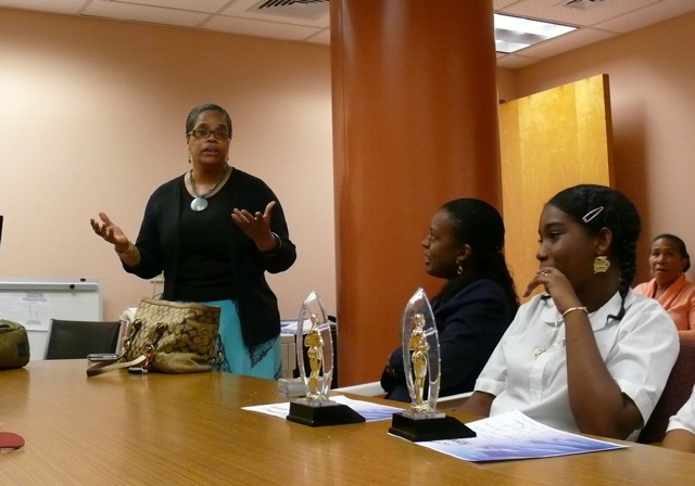 Prevention Coordinator Maren Roebuck (standing) talks about two new videos tackling underage drinking at their premier Monday on St. Croix.