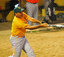 The Hummers' Kai Schjang connects on the first of two home runs.