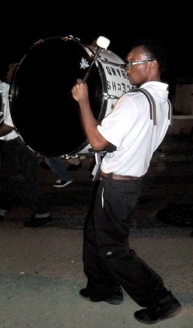 A marching band drummer takes part in the parade.