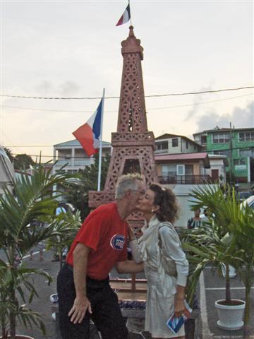 Sen. Craig Barshinger steals a "Bastille kiss" from Honorary French consul Odile de Lyrot under the Eiffel Tower.