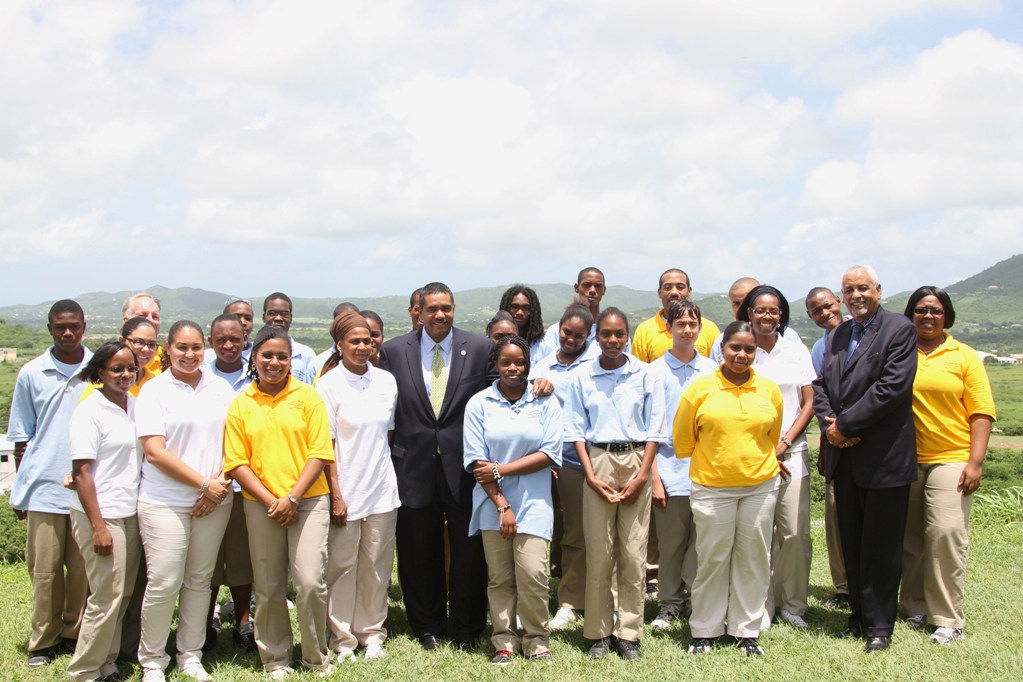 Gov. John deJongh Jr. (center) joins students and instructors of the ADA Vocational Summer Program at Kingshill School on St. Croix Monday to commemorate the 20th anniversary of the Americans With Disabilities Act.