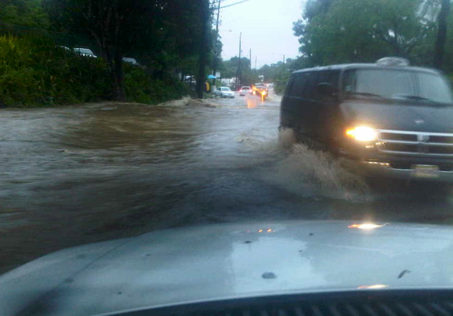 High water covers a St. Thomas road. (Photo courtesy V.I. National  Park Superindent Mark Hardgrove.)