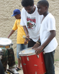 Drumming and walking for African Liberation Day.