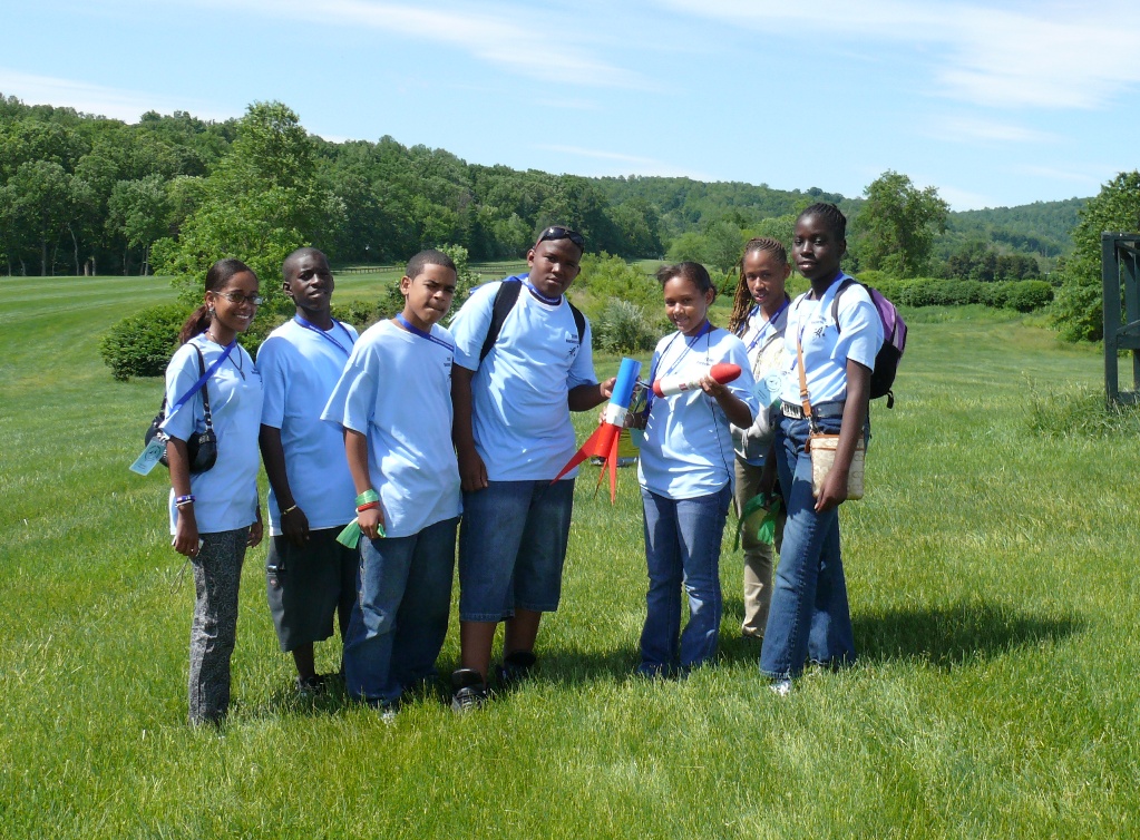 The Elena Christian Junior High Rocketry Club with their recovered rocket just after its flight.