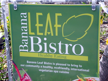 The sign shows the way to the Banana Leaf Bistro behind Long Bay Pueblo.