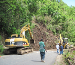 Crews cleaning up the slide that went from Carey Mercurio's house to Centerline Road.