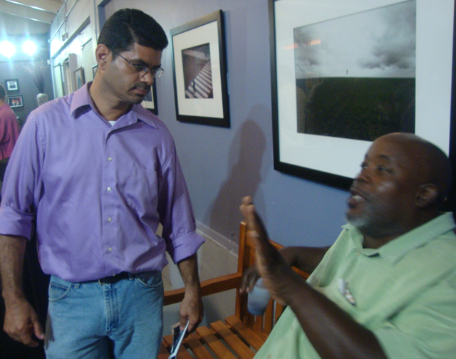 Sen. Sammuel Sanes, left, and Senate candidate Wayne 'Bully' Petersen chat at Generation Now's event Wednesday.