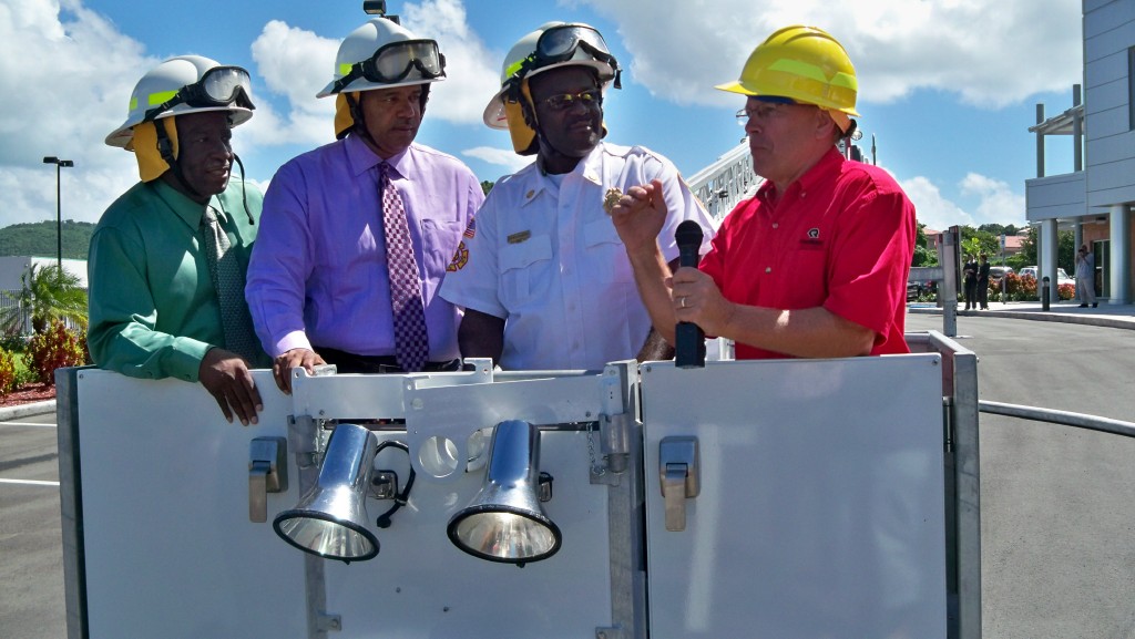 Lt. Gov. Gregory Francis, Gov. John deJongh Jr., Fire Chief Steve Brow and Rob Kreikemeier (from left) take off in the bucket.