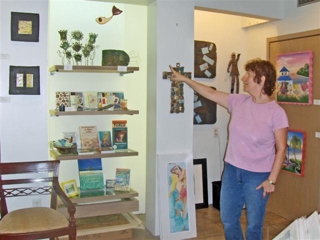 Gallery St. Thomas owner Ruth Prager points out a metal sculpture by Trudi Gilliam.