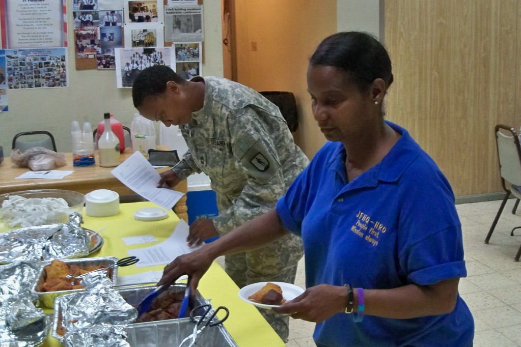 VING Master Sgt. Karen Williams (left) and Sgt. Maj. Eugenie Santos getting a bite to eat.