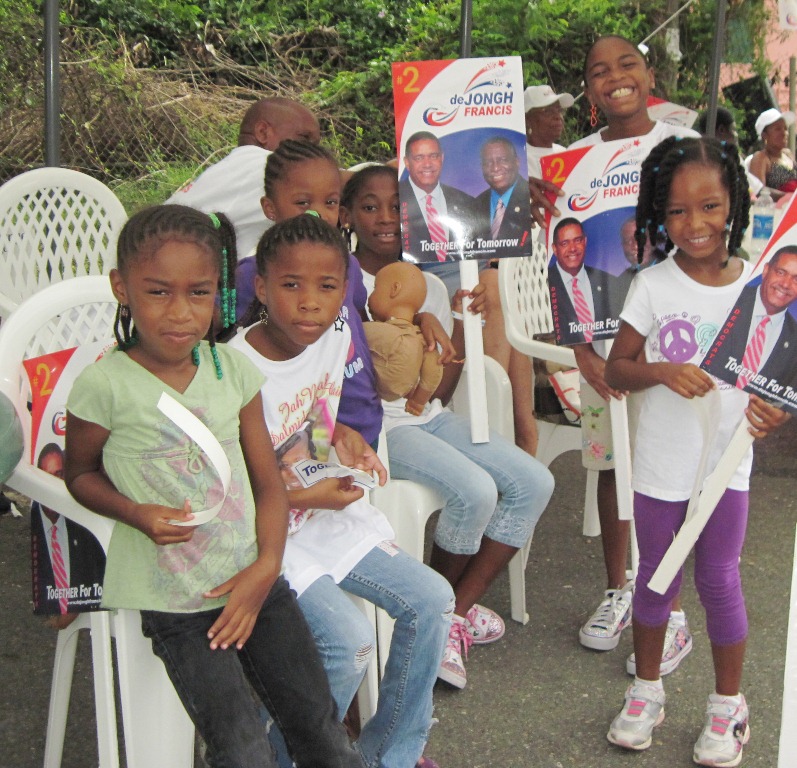 Kids out with their parents who were supporting candidates at Guy Benjamin School.