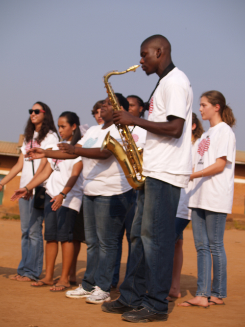 V.I. teens share a song in Banda village. 
