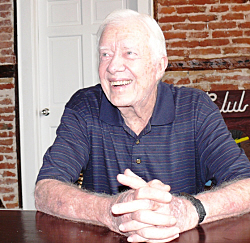 Former President Jimmy Carter meets the press at the Comanche Hotel.
