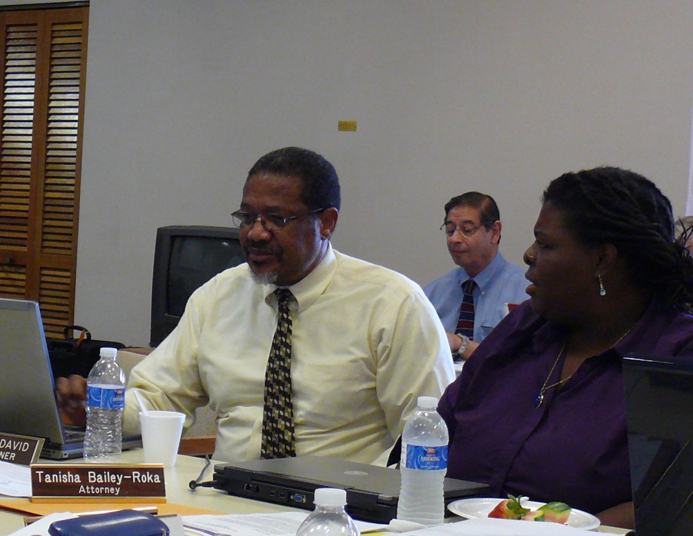 PSC Commissioner Verne David consulting with PSC attorney Tanisha Bailey-Roka at Wednesday's hearing.