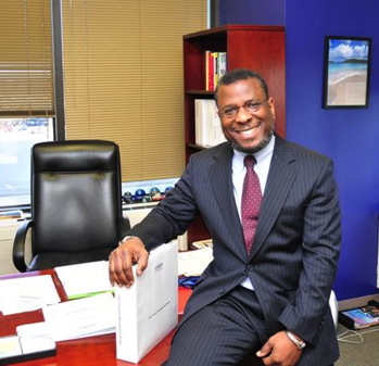 Felix Thomas in his Fall Church, Va., office at Network Security Systems Plus.