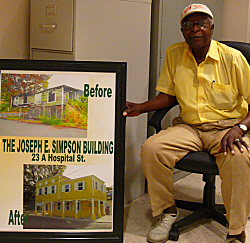 Alphonso Franklin of Our Town Frederiksted with an example of the group's work.