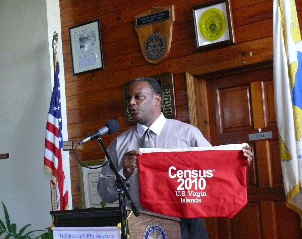 Census media and partnership specialist Emmett Hansen displays the Census 2010 bag that official census takers will be using.