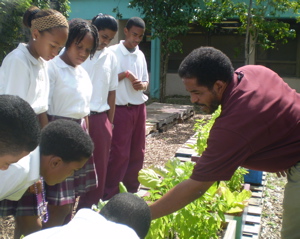 Roberto James works with Woodson Junior High school students.